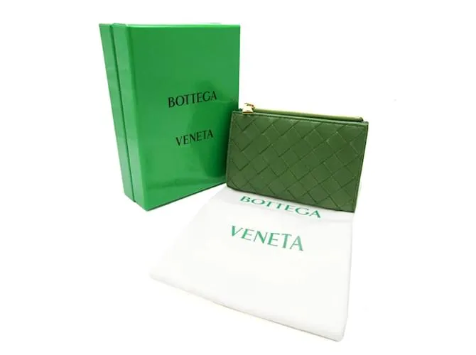 Billetera bi-fold de cuero verde oscuro Intrecciato de Bottega Veneta 